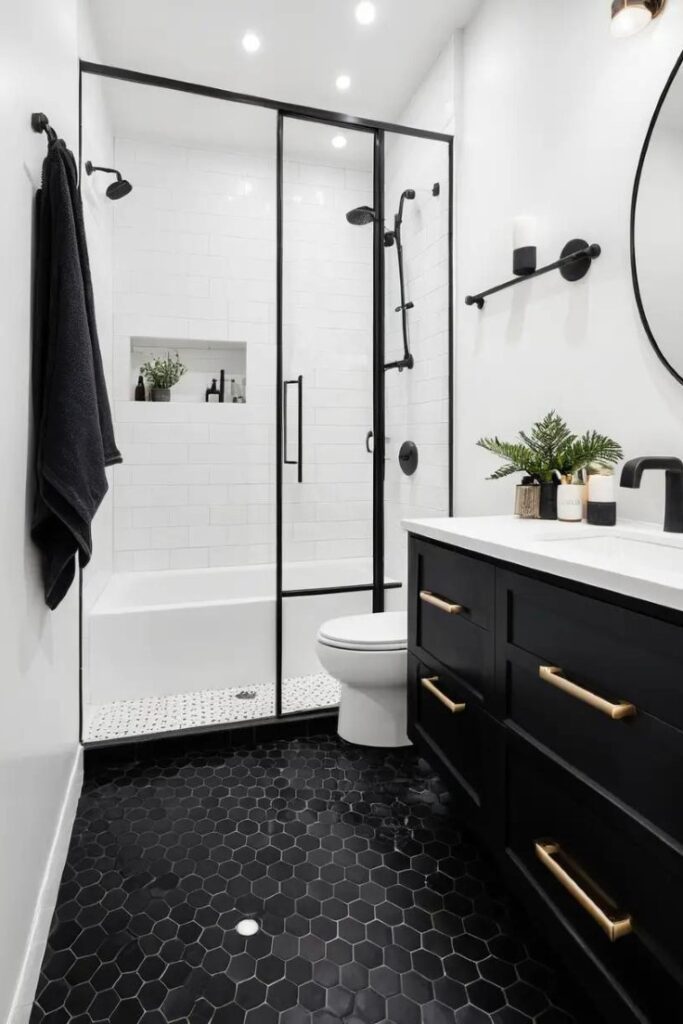 A bathroom featuring black hexagon floor tiles for depth and contrast.
