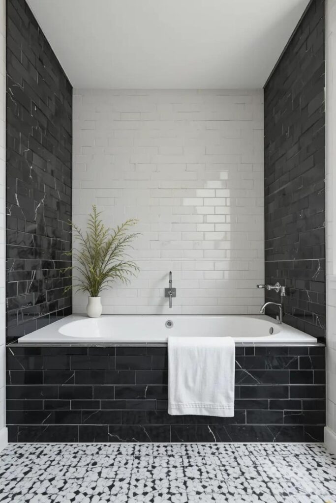A built-in bathtub with a black surround for a bold, modern touch.