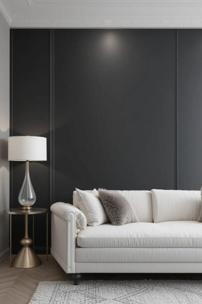 A living room with a bold dark gray feature wall, adding depth and contrast.