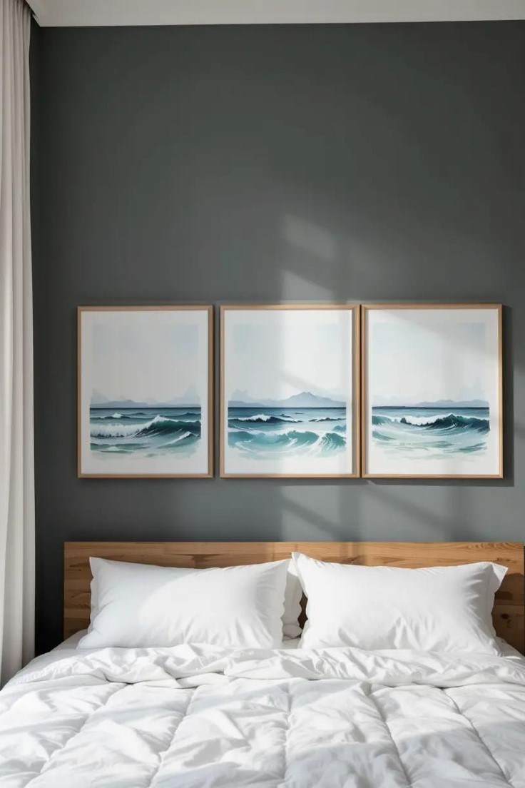 Summer wall art like watercolor seascapes adds a seasonal feel to bedroom decor.